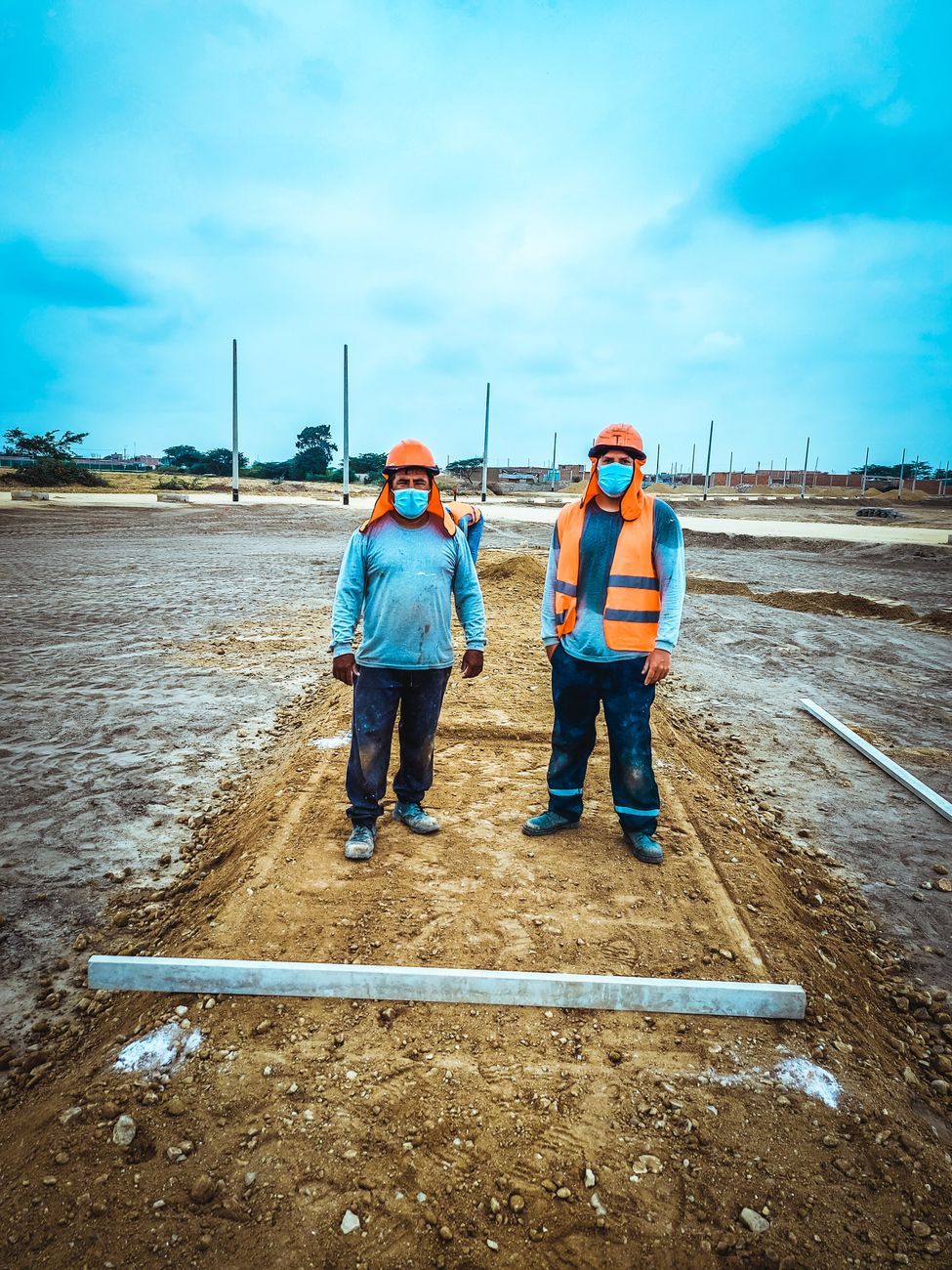construction workers wearing face masks